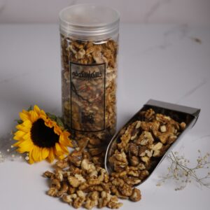 گردو دندانه خشکبار شکوفه با کیفیت بالا و آماده مصرف، مناسب برای غذاها و دسرها.