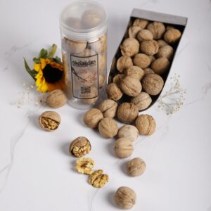 گردو پوست کاغذی خشکبار شکوفه با پوستی نازک، کیفیت بالا و طعمی تازه و ارگانیک.
